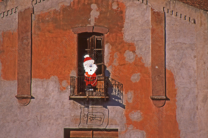 Santa on the Balcony 
 Sardinia, Italy 2001